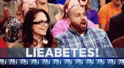 Man And Woman Laughing At Lieabetes Sign GIF