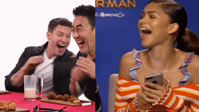 Man And Woman Laughing At R-Man Coming Sign GIF