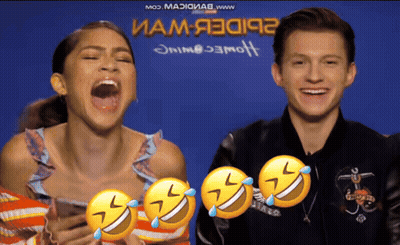 Man And Woman Laughing In Front Of Blue Background Saying Mod Maxxiiab GIF