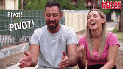 Man And Woman Laughing Saying Pivot GIF