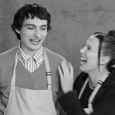Man And Woman Laughing Together GIF