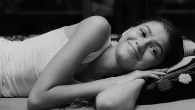 Man And Woman Laughing Woman Holding Cell Phone GIF