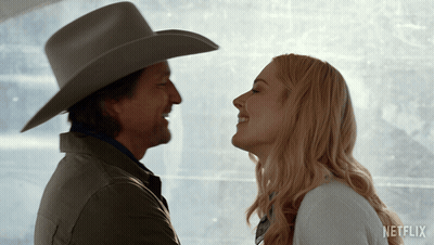 Man And Woman Laying In Bed GIF