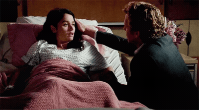 Man And Woman Laying In Hospital Bed GIF