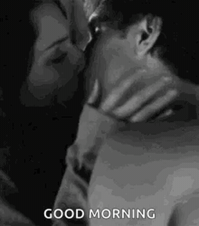 Man And Woman Laying On Bed GIF