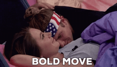 Man And Woman Laying On Bed Saying Bold Move GIF