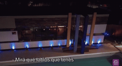 Man And Woman Laying On Bed With Mira Que Labios Que Tenes GIF