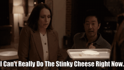 Man And Woman Looking At Cheese Tray Saying I Can't Really GIF