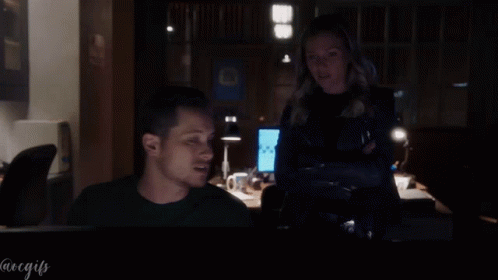 Man And Woman Looking At Computer With @Regifs GIF