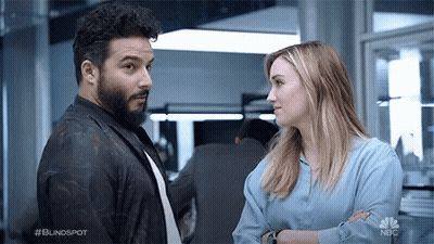 Man And Woman Looking At Each Other GIF