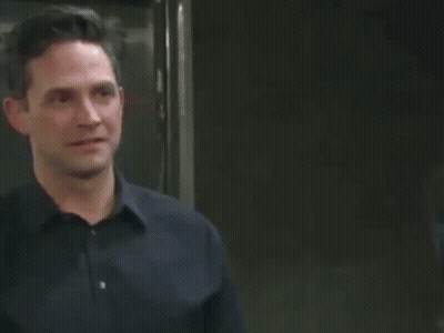 Man And Woman Looking At Each Other GIF