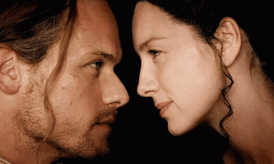 Man And Woman Looking At Each Other GIF