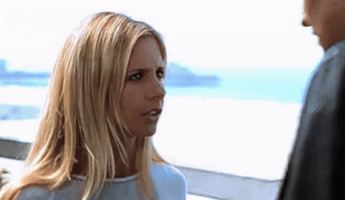 Man And Woman Looking At Each Other GIF
