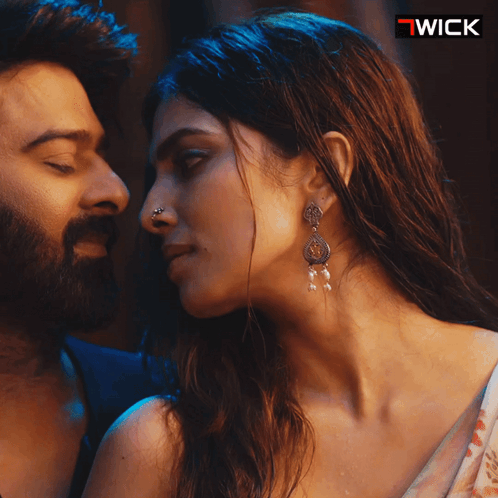 Man And Woman Looking At Each Other GIF
