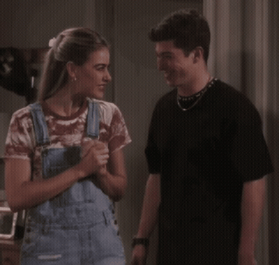 Man And Woman Looking At Each Other GIF