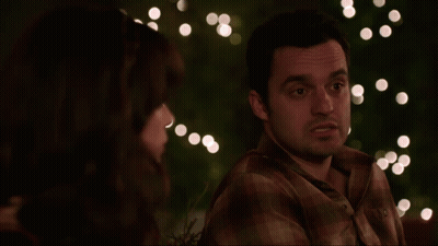 Man And Woman Looking At Each Other And Look Around Once In A While GIF
