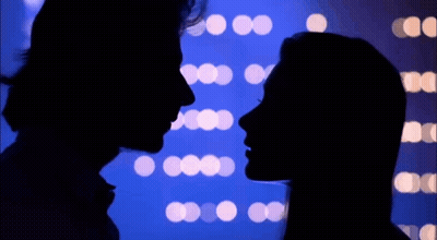 Man And Woman Looking At Each Other GIF