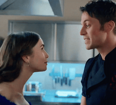 Man And Woman Looking At Each Other GIF