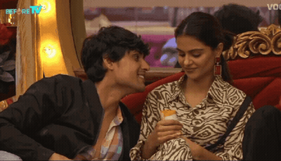 Man and Woman Looking at Each Other Before TV