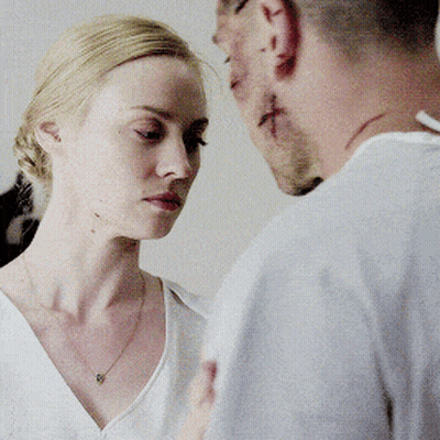 Man And Woman Looking At Each Other GIF