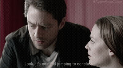 Man And Woman Looking At Each Other Caption Look It's No Good Jumping To Conclusions GIF