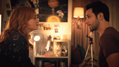 Man And Woman Looking At Each Other GIF