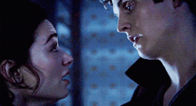 Man And Woman Looking At Each Other Eyes Closed GIF