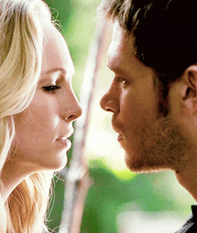 Man And Woman Looking At Each Other Eyes Closed GIF