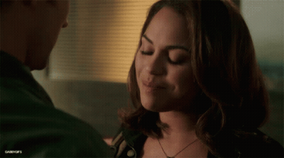 Man And Woman Looking At Each Other GIF