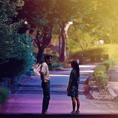 Man And Woman Looking At Each Other GIF