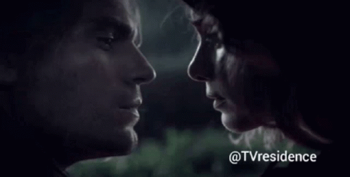 Man And Woman Looking At Each Other GIF