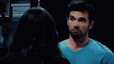 Man And Woman Looking At Each Other GIF