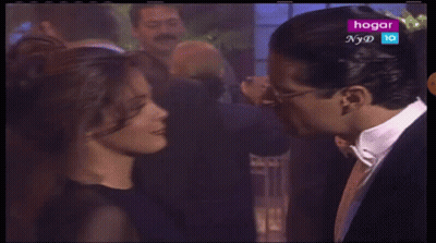Man And Woman Looking At Each Other Hogar NYD GIF