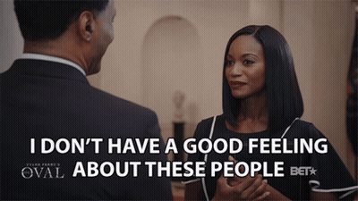 Man And Woman Looking At Each Other I Don't Have A Good Feeling About These People Bet GIF