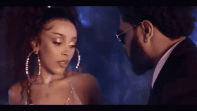 Man And Woman Looking At Each Other In Dark Room GIF