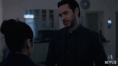 Man And Woman Looking At Each Other In Dark Room Netflix Trailer GIF