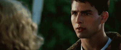 Man And Woman Looking At Each Other In Movie GIF