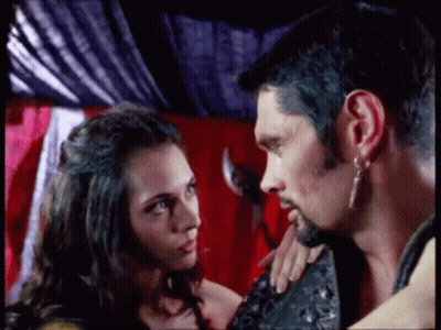 Man And Woman Looking At Each Other In Tent GIF