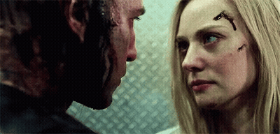 Man And Woman Looking At Each Other GIF