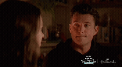 Man And Woman Looking At Each Other Merry Thanksgiving Hallmark GIF