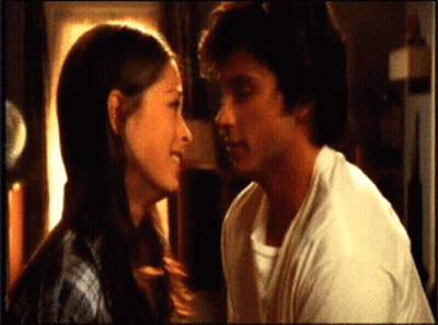 Man And Woman Looking At Each Other GIF
