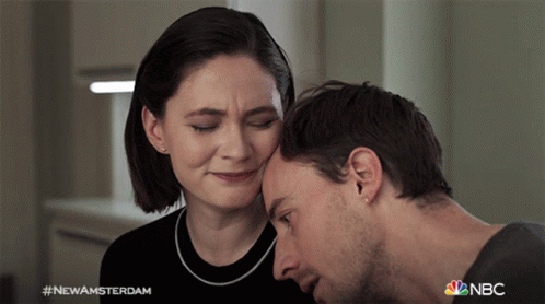 Man And Woman Looking At Each Other New Amsterdam GIF