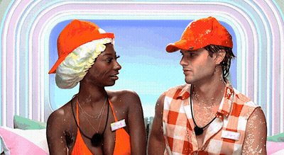 Man And Woman Looking At Each Other Sally Nametag GIF