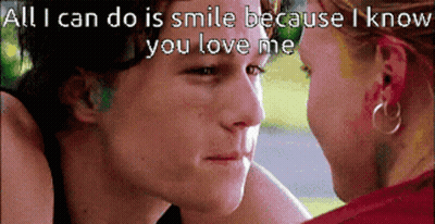 Man And Woman Looking At Each Other Saying All I Can Do Is Smile GIF