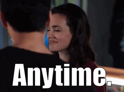 Man And Woman Looking At Each Other Saying Anytime GIF