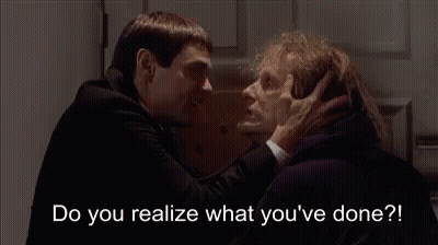 Man And Woman Looking At Each Other Saying Do You Realize What You've Done GIF