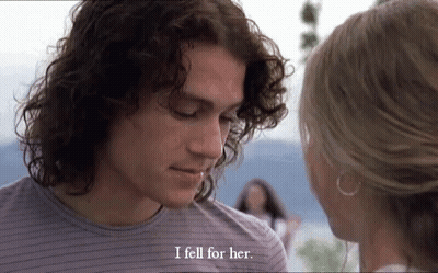 Man And Woman Looking At Each Other Saying I Fell For Her GIF