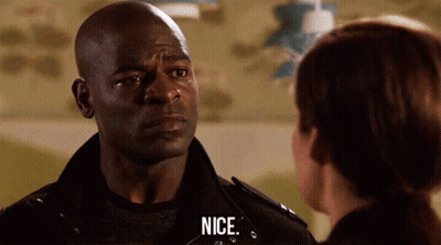 Man And Woman Looking At Each Other Saying Nice GIF