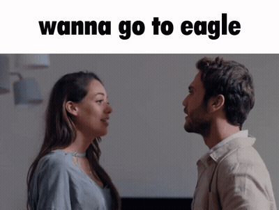 Man And Woman Looking At Each Other Saying Wanna Go To Eagle GIF