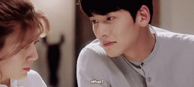 Man And Woman Looking At Each Other Saying What GIF